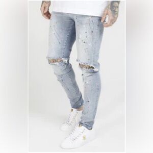 Sik Silk Bust Knee Riot Denim Jeans in Light Blue.  Size Medium
